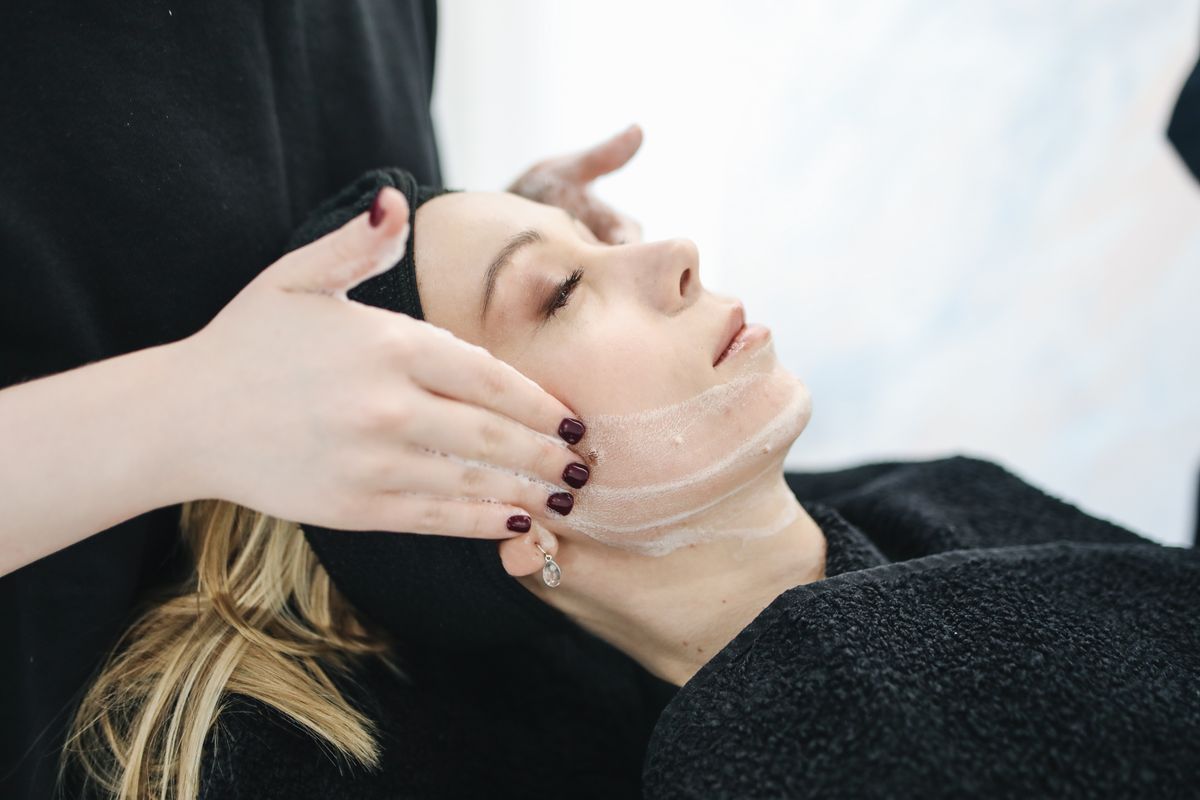 A gentle facial massage, stock photograph